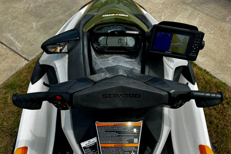 Slide: The Image of 2019 Sea-Doo FishPro 155 dashboard with Garmin GPS, handlebars, and control panel. - 7