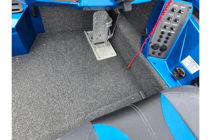 Slide: The Image of Interior of 2022 Vexus AVX2080 boat showing control panel and foot pedal. - 14