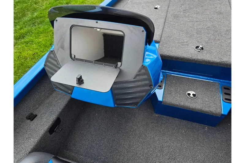 Slide: The Image of 2022 Vexus AVX2080 boat interior with storage compartment and carpeted flooring. - 15