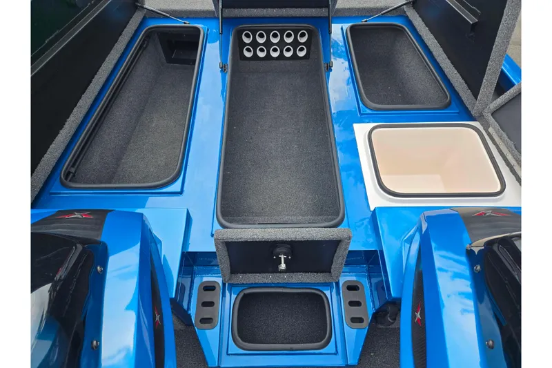 Slide: The Image of 2022 Vexus AVX2080 boat interior with storage compartments and rod holders. - 17