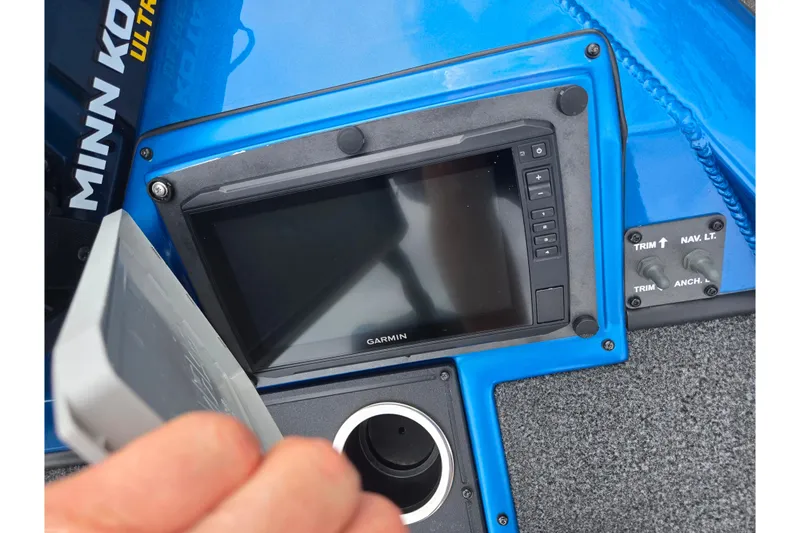 Slide: The Image of 2022 Vexus AVX2080 boat dashboard with Garmin display and Minn Kota trolling motor. - 19