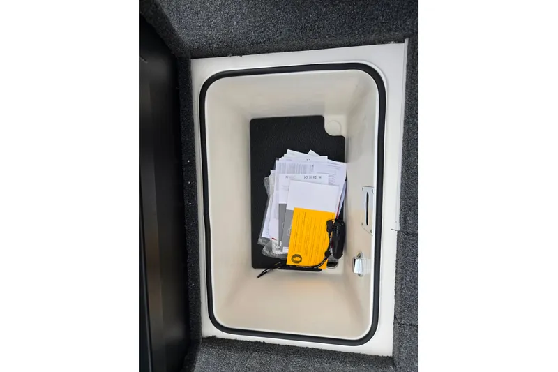 Slide: The Image of Storage compartment in 2022 Vexus AVX2080 boat with documents and accessories. - 26