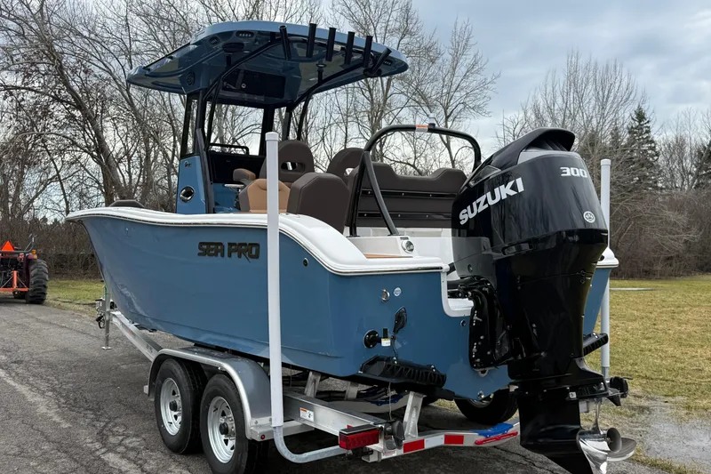 Slide: The Image of 2026 Sea Pro 245FLXR Sandbar boat with Suzuki 300 engine on trailer. - 3