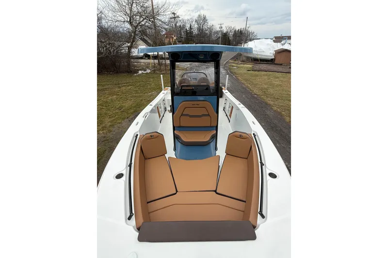 Slide: The Image of 2026 Sea Pro 245FLXR Sandbar boat with tan seating and sleek design. - 5