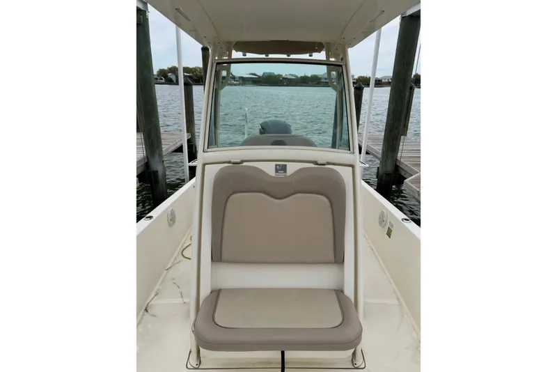 The Image of 2013 Scout 251 XS boat interior with seating and water view. - 1
