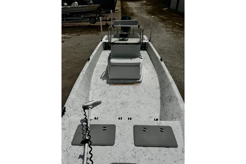 Slide: The Image of 2007 Haynie 23 Bigfoot boat interior with seating and storage compartments. - 10