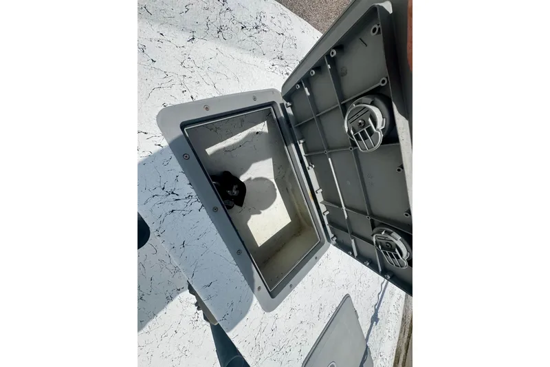 Slide: The Image of Open storage compartment on 2007 Haynie 23 Bigfoot boat, showing interior details. - 20