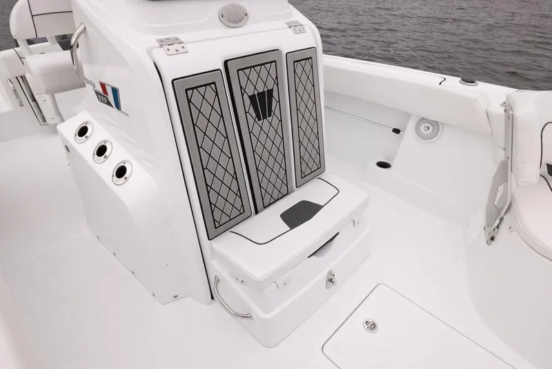 Slide: The Image of Person adjusting seat on 2023 Wellcraft 222 Fisherman boat. - 8