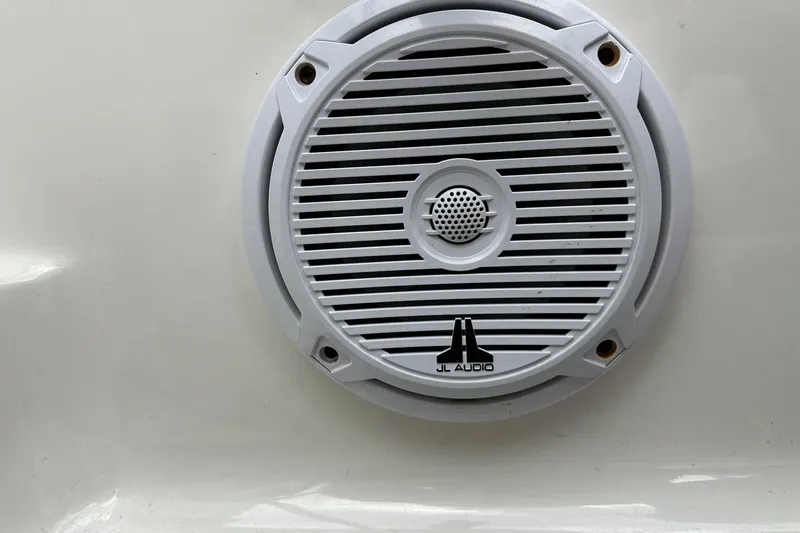 Slide: The Image of White JL Audio speaker on a 2016 Chaparral 21 H2O Sport boat. - 50