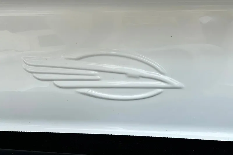 Slide: The Image of Embossed Chaparral logo on 2016 Chaparral 21 H2O Sport boat hull. - 53
