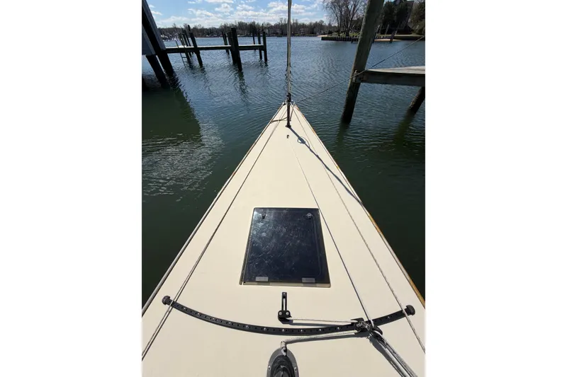 Slide: The Image of Bow view of 2014 C.W. Hood 32 Daysailer docked on calm water. - 6