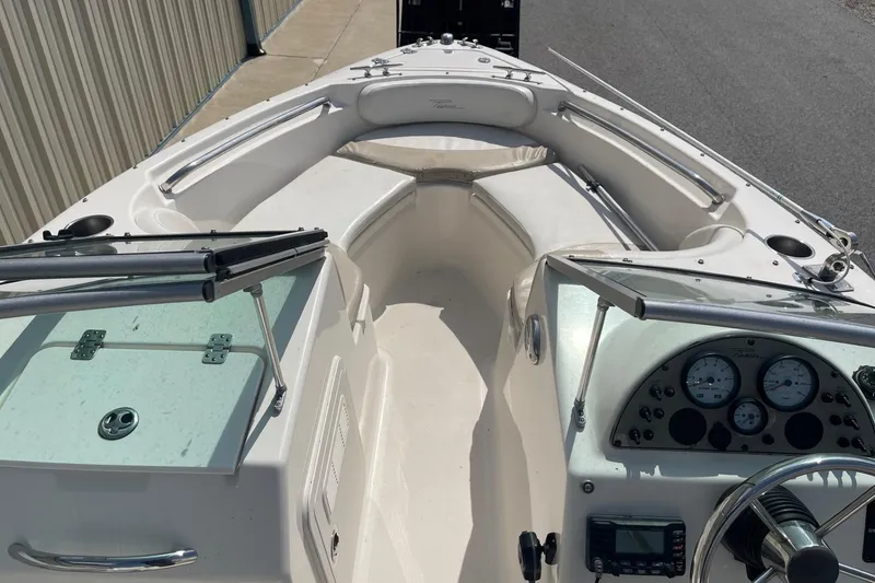 Slide: The Image of 2013 Pioneer 175 Venture boat interior with dashboard and seating area. - 25