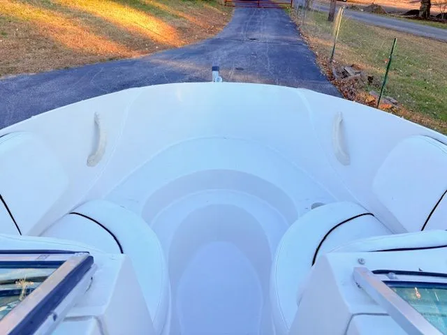 Slide: The Image of Interior view of a 2007 Sea Ray 185 boat on a driveway. - 10