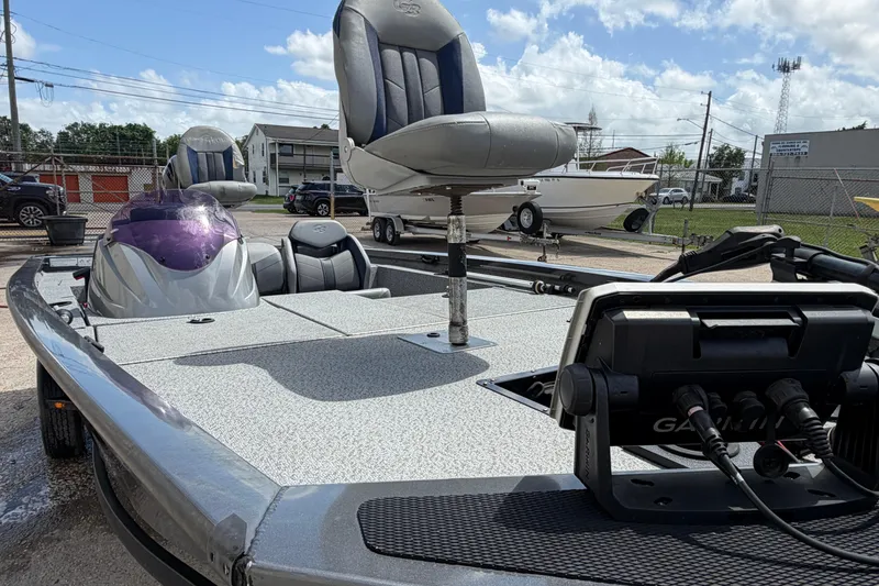 Slide: The Image of 2022 G3 Sportsman 1710 fishing boat with Garmin electronics, parked outdoors. - 7