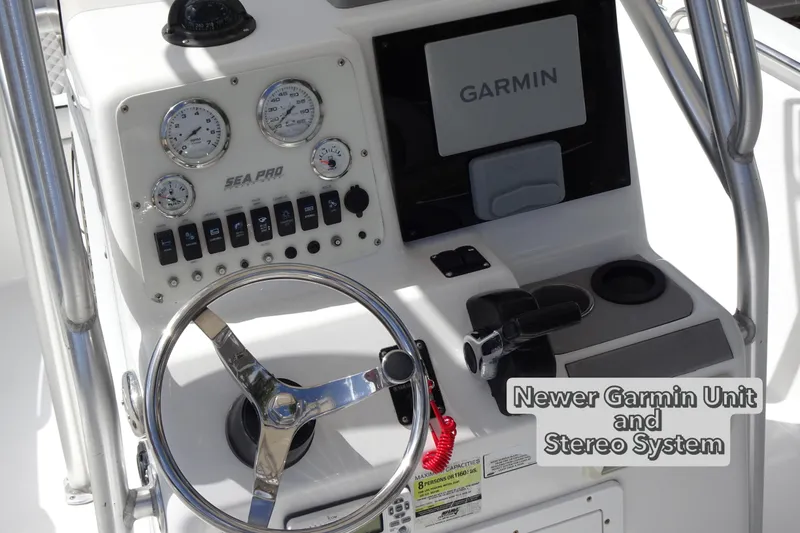 Slide: The Image of 2005 Sea Pro 206 Center Console with Garmin unit and stereo system. - 10