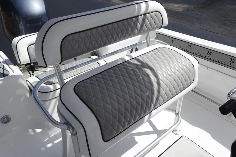 Slide: The Image of 2005 Sea Pro 206 Center Console boat seat with diamond-stitched upholstery. - 12