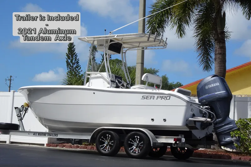 Slide: The Image of 2005 Sea Pro 206 Center Console boat on 2021 aluminum tandem axle trailer. - 4