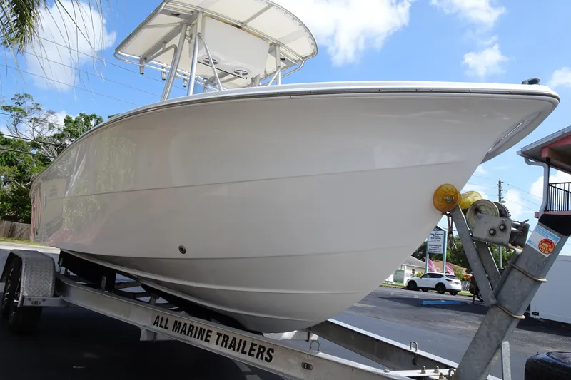 Slide: The Image of 2005 Sea Pro 206 Center Console boat on trailer under blue sky. - 5
