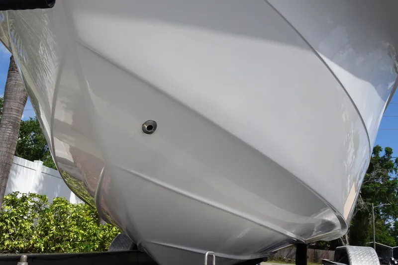 Slide: The Image of 2005 Sea Pro 206 Center Console boat hull, close-up view, showcasing sleek design. - 7