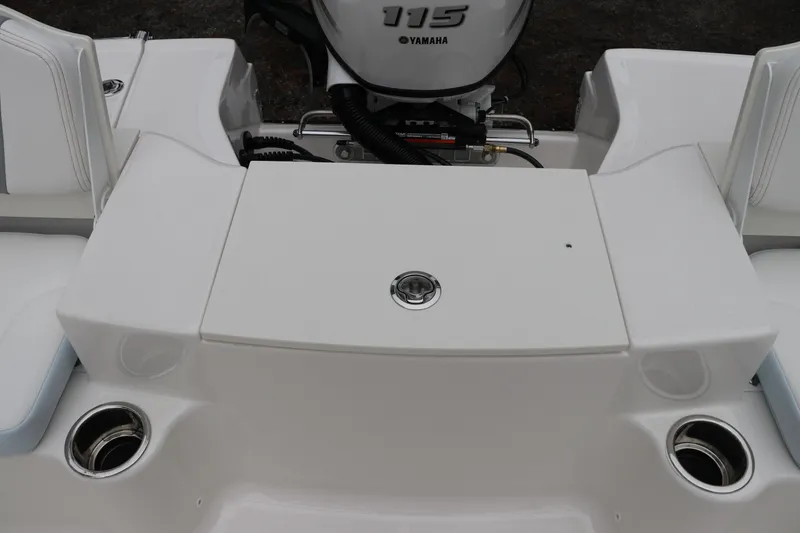 Slide: The Image of 2026 Robalo R180 Center Console boat with Yamaha engine, rear seating area. - 12