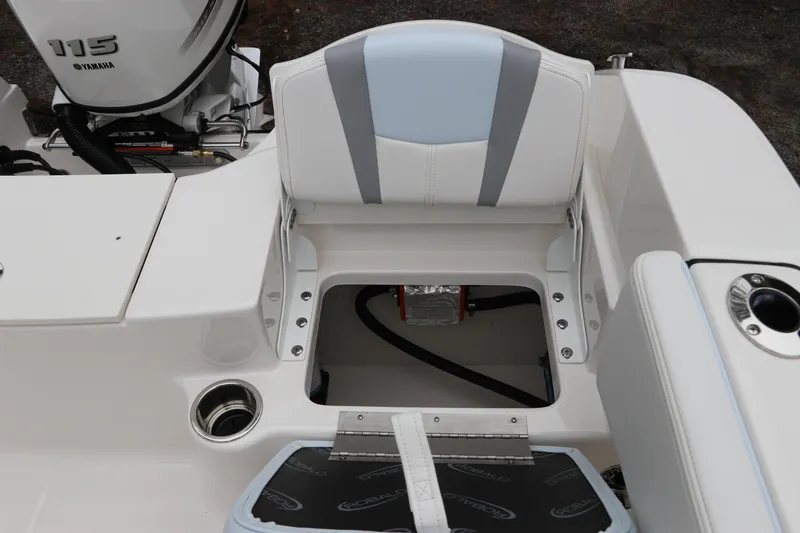 Slide: The Image of 2026 Robalo R180 Center Console boat seat with storage compartment and Yamaha 115 engine. - 15