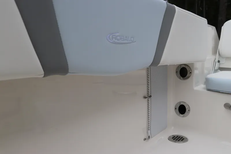 Slide: The Image of 2026 Robalo R180 Center Console boat interior with seating and drainage features. - 18