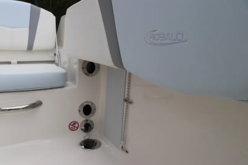 Slide: The Image of 2026 Robalo R180 Center Console interior with seating and logo detail. - 19