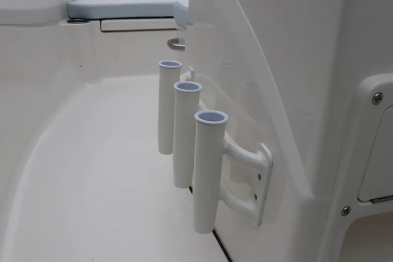 Slide: The Image of Rod holders on 2026 Robalo R180 Center Console boat interior. - 29