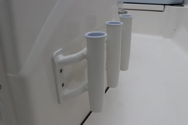 Slide: The Image of Rod holders on 2026 Robalo R180 Center Console boat interior. - 30