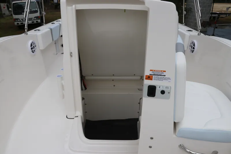 Slide: The Image of 2026 Robalo R180 Center Console boat interior storage compartment. - 33