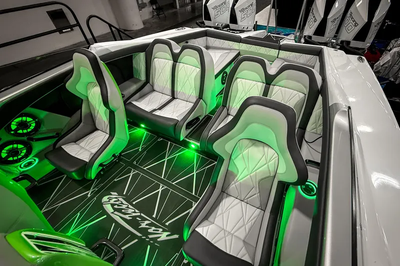 Slide: The Image of Interior of 2027 Nor-Tech 4000 Roadster with illuminated seating and modern design. - 9