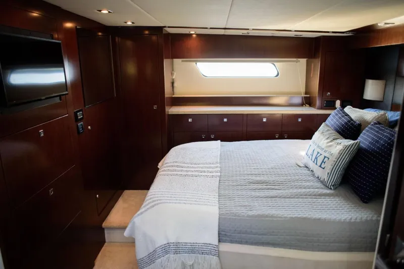 Slide: The Image of Luxurious bedroom interior of 2012 Cruisers Yachts 48 Cantius with elegant wood finishes. - 31