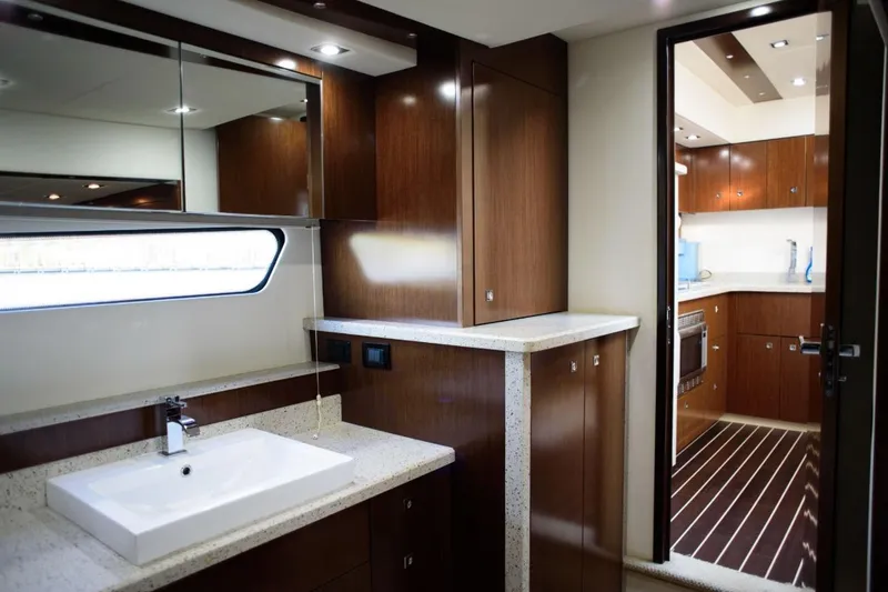 Slide: The Image of Luxurious interior of 2012 Cruisers Yachts 48 Cantius with modern kitchen and bathroom. - 33