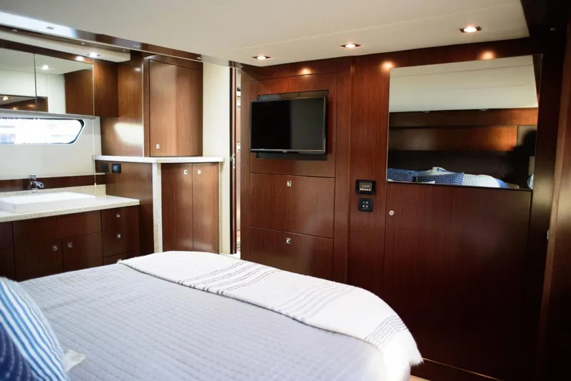 Slide: The Image of Luxurious interior of 2012 Cruisers Yachts 48 Cantius with elegant wood finishes and modern amenities. - 34