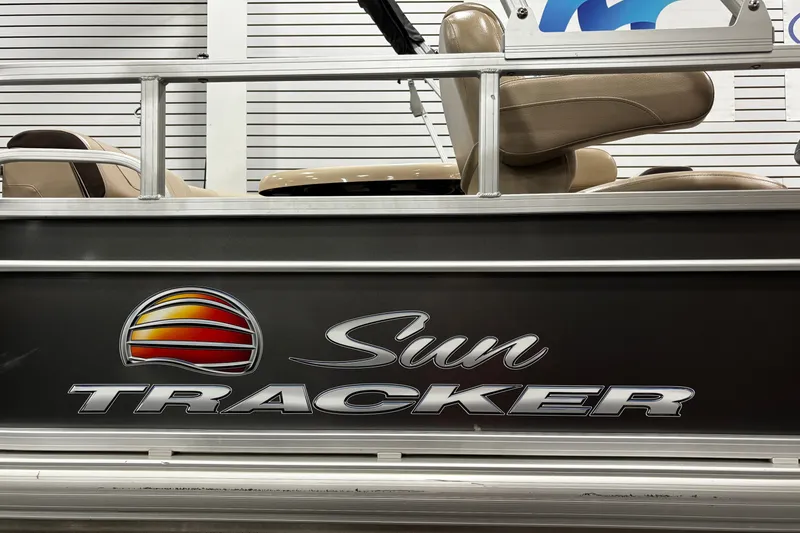 Slide: The Image of 2018 Sun Tracker Party Barge 20 DLX pontoon boat with logo and seating detail. - 19