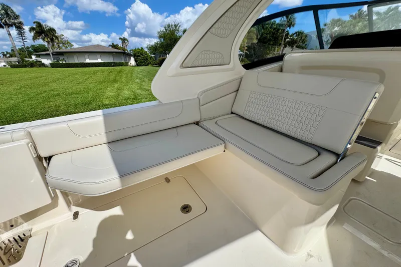 Slide: The Image of 2027 Scout 288 Dorado boat interior with luxurious seating and elegant design. - 10