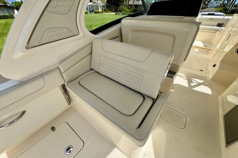 Slide: The Image of 2027 Scout 288 Dorado boat interior with luxurious seating and modern design. - 11