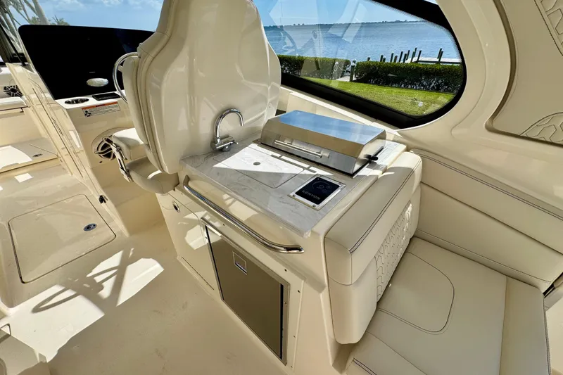 Slide: The Image of Interior of 2027 Scout 288 Dorado boat with luxurious seating and modern amenities. - 18