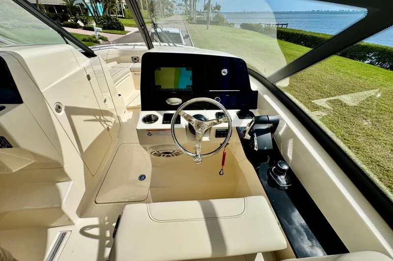 Slide: The Image of Interior view of Scout 288 Dorado 2027 boat cockpit. - 29