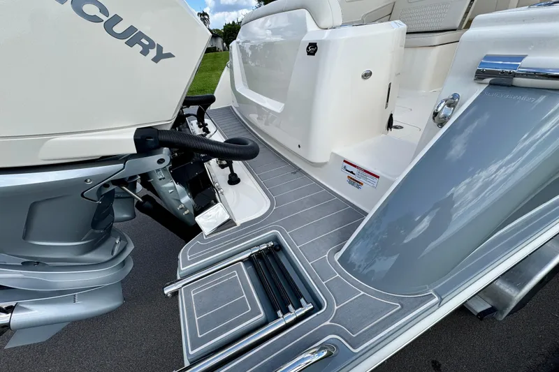 Slide: The Image of 2027 Scout 288 Dorado boat with Mercury engine and sleek deck design. - 3