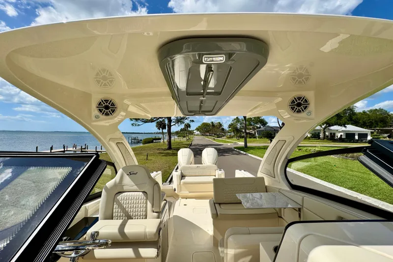 Slide: The Image of Luxurious interior of 2027 Scout 288 Dorado boat with scenic waterfront view. - 39