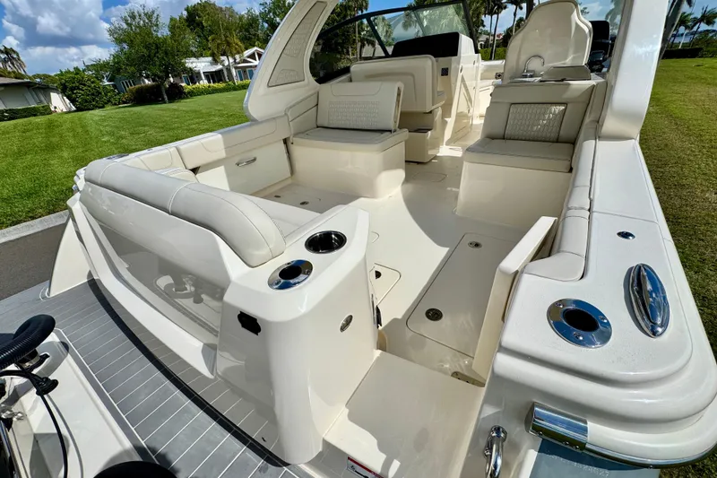 Slide: The Image of 2027 Scout 288 Dorado boat interior with luxurious seating and modern amenities. - 4