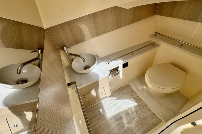 Slide: The Image of Luxurious 2027 Scout 288 Dorado boat bathroom with modern sink and toilet design. - 41