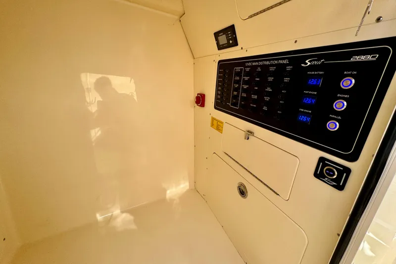 Slide: The Image of 2027 Scout 288 Dorado control panel with digital displays and switches. - 43