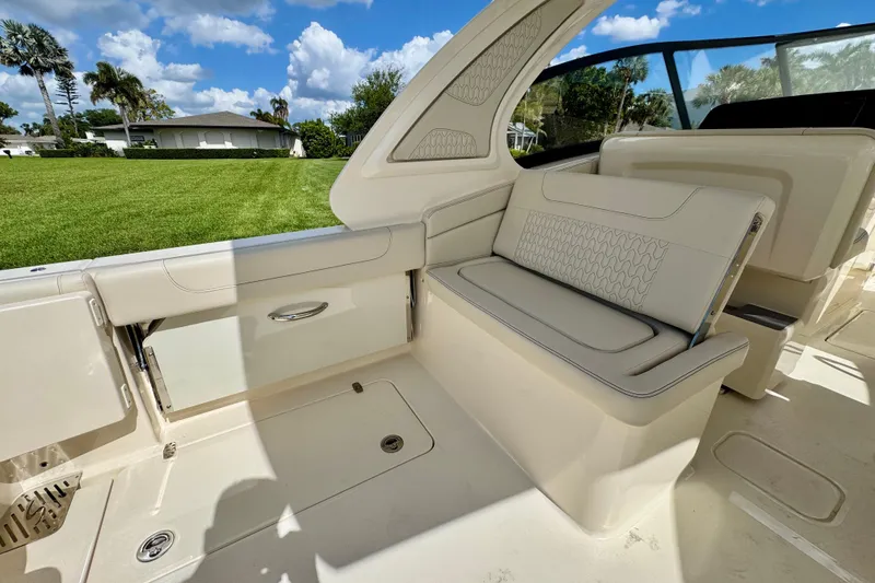 Slide: The Image of 2027 Scout 288 Dorado boat interior with luxurious seating and sleek design. - 9