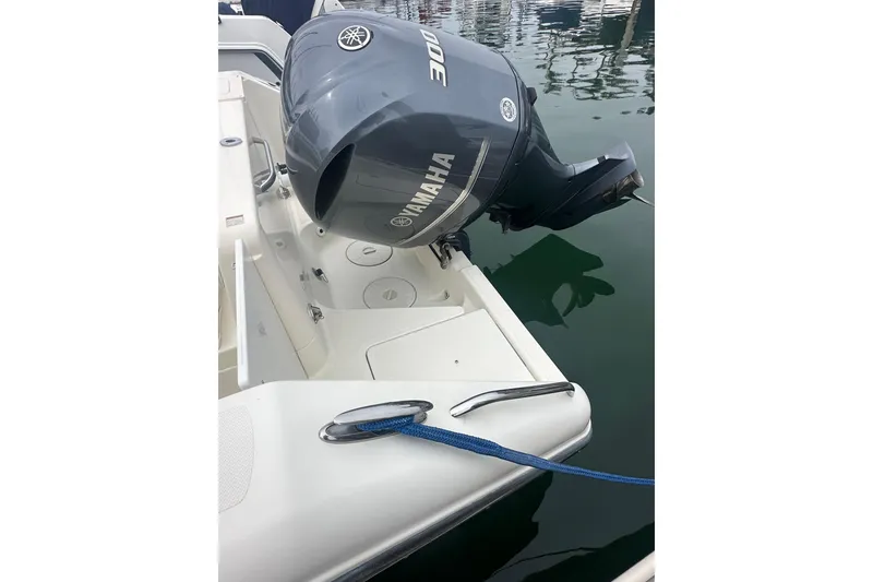 Slide: The Image of 2007 Pursuit 235 Denali LS boat with Yamaha 300 outboard motor docked. - 3