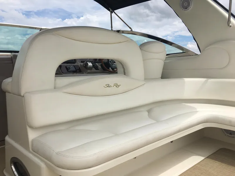 Slide: The Image of Luxurious interior of 2000 Sea Ray 410 Sundancer yacht with white leather seating. - 11