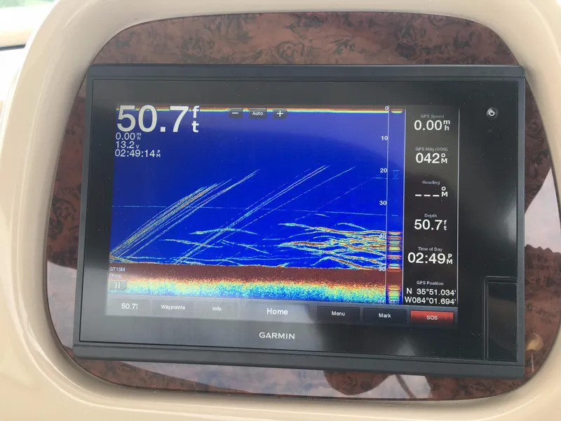 Slide: The Image of Garmin marine display on 2000 Sea Ray 410 Sundancer showing depth and sonar data. - 18