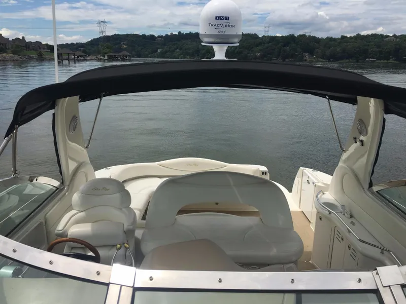 Slide: The Image of 2000 Sea Ray 410 Sundancer yacht with spacious cockpit and scenic water view. - 27