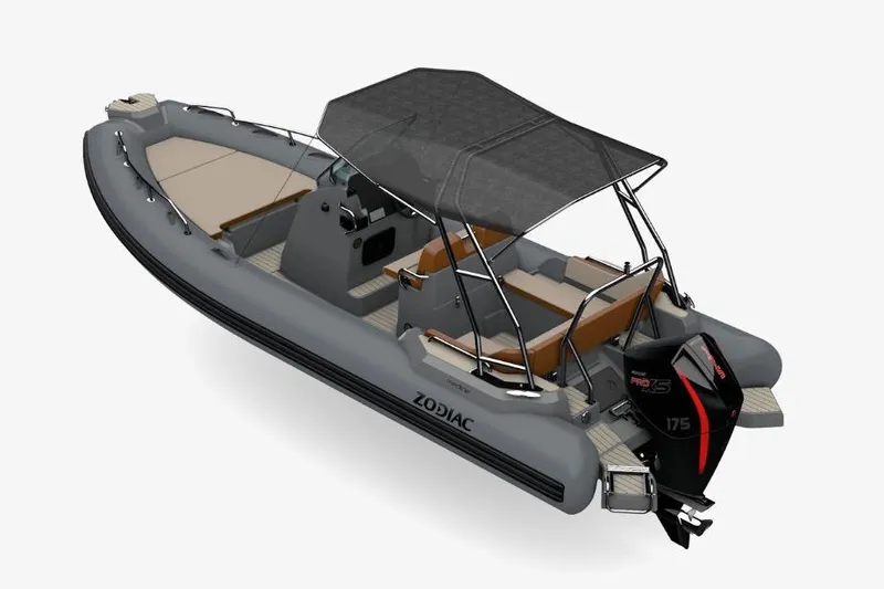 Slide: The Image of 2026 Zodiac Medline 6.8 boat with canopy and powerful outboard motor. - 5